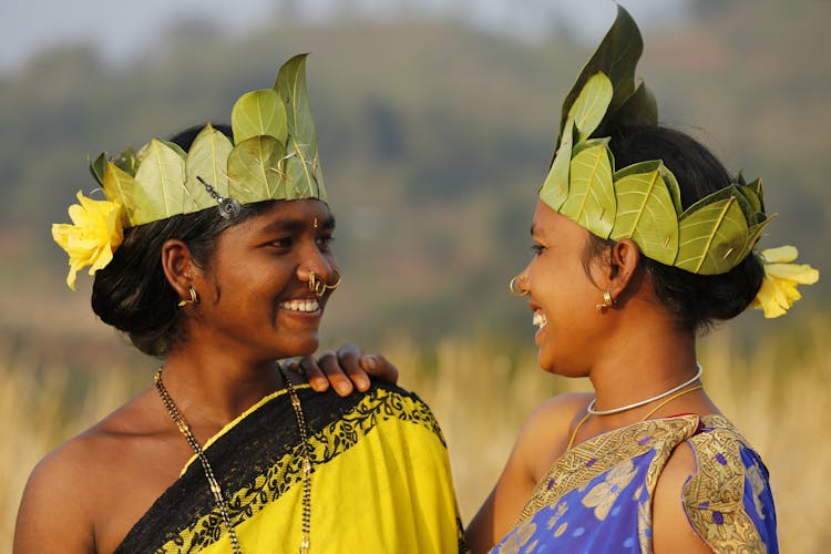 Women In Leaves Crowns Smiling