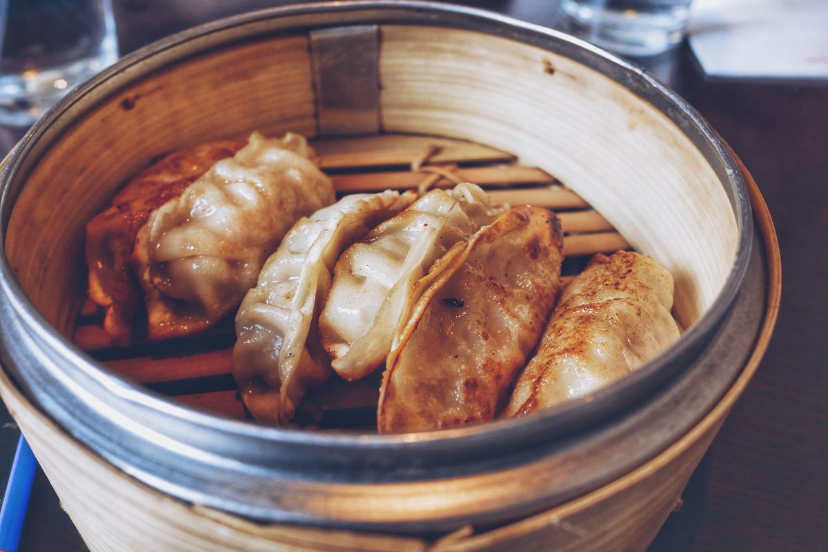 Steamed dumplings in a bamboo steamer