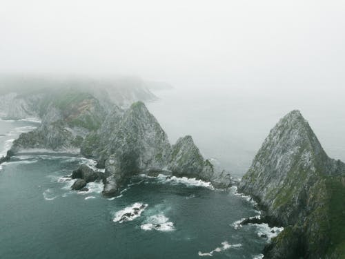 Fog over Rocks on Sea