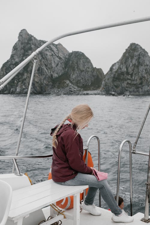 Woman Sitting on Boat 