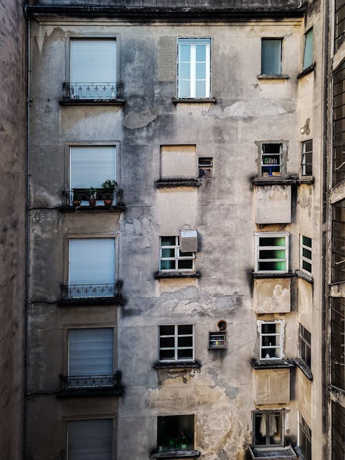 Brown Concrete Building with Glass Windows