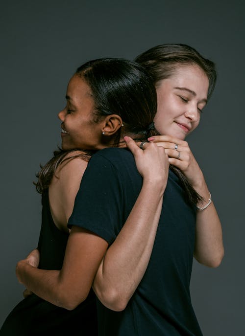 Free Happy Women Hugging Stock Photo