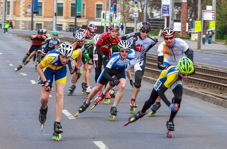 Men Rollerblading On Road