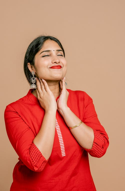 Free A Woman Posing With Eyes Closed Stock Photo