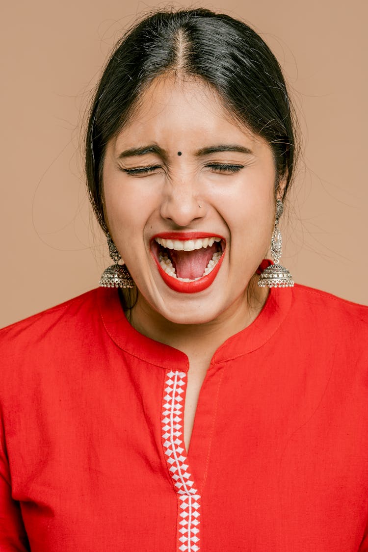 A Woman With Wide Open Mouth