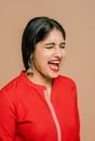 A Woman in Red Dress Screaming