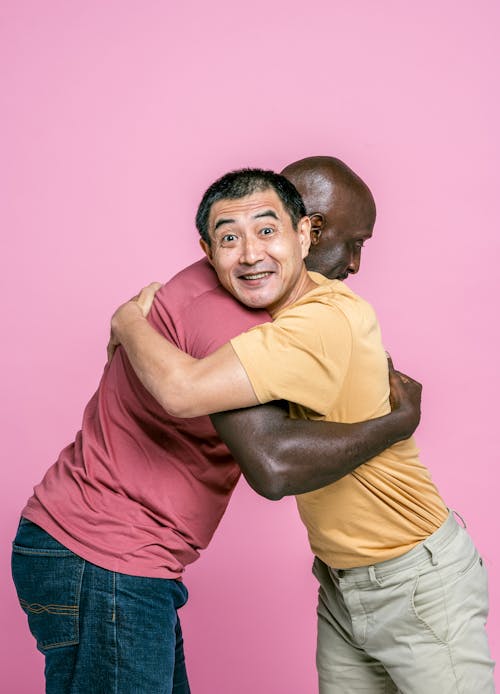 Free Two Men Embracing  Stock Photo