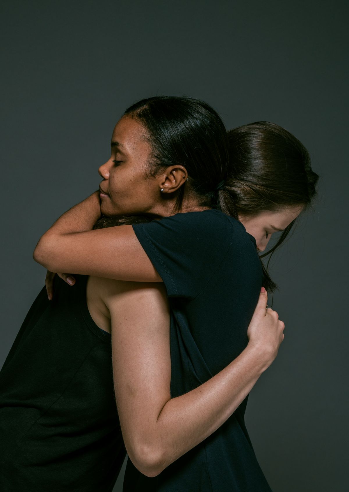 Two women sharing a supportive hug