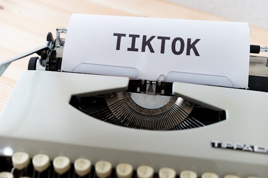 A vintage typewriter holding paper with TikTok written, symbolizing modern social media trends.