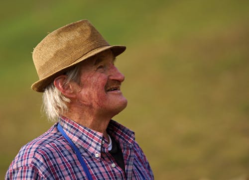 Man Wearing Brown Bucket Hat