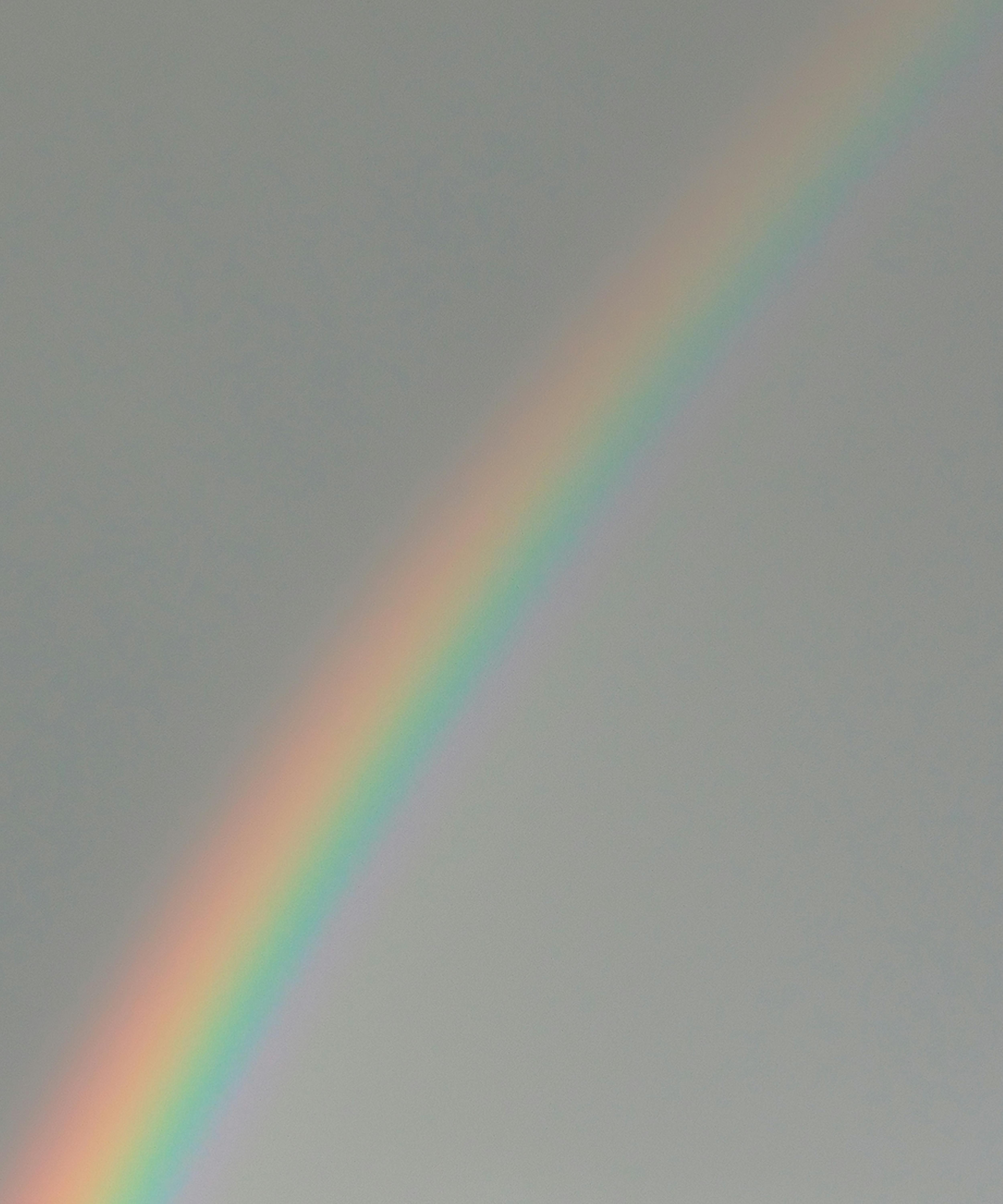 Rainbow Across the Road during Daytije · Free Stock Photo