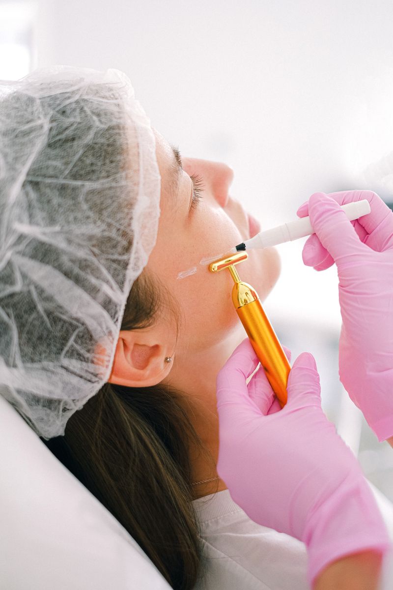 Cosmetologist planning a Sculptra volume treatment