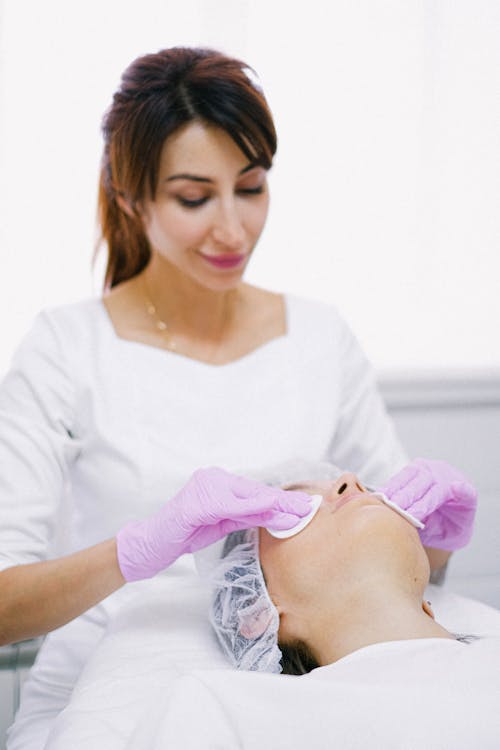 A Woman having Facial Treatment