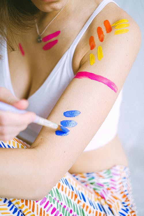 Free A Woman Painting Her Arm  Stock Photo