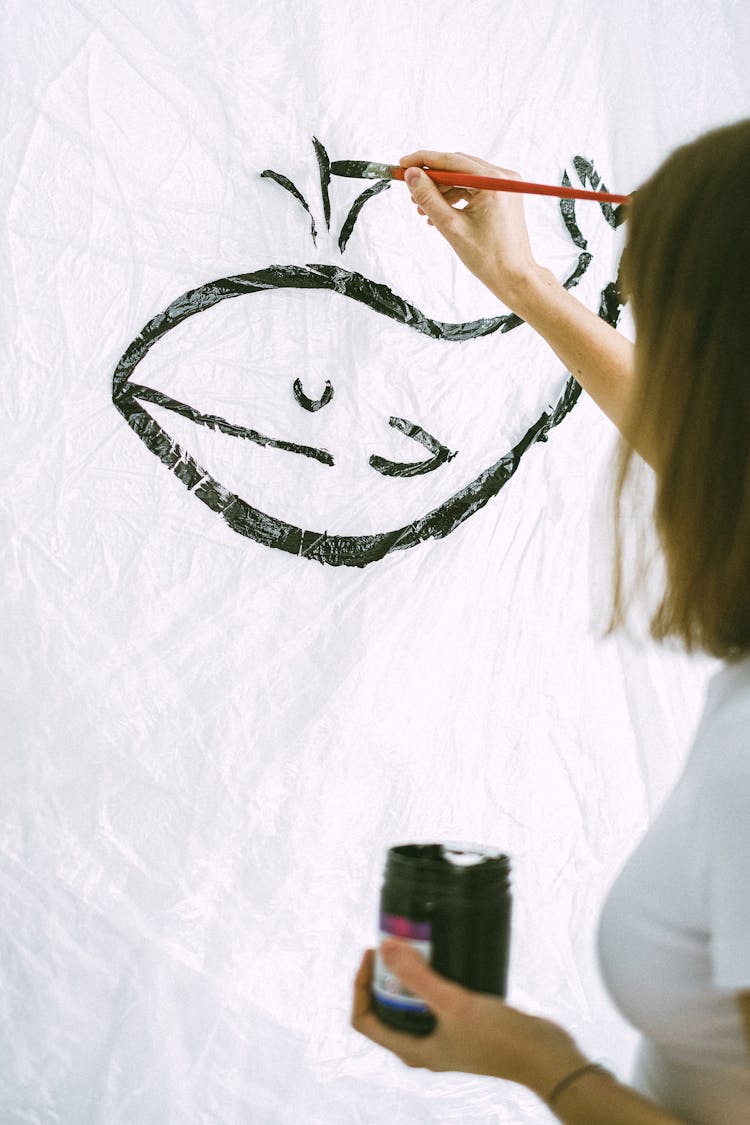 Photo Of A Person Drawing A Whale