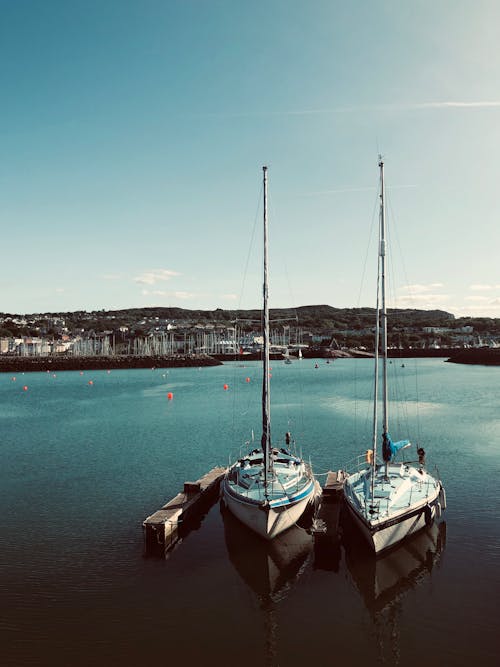 Sailboats on Water Under the Blue Sky