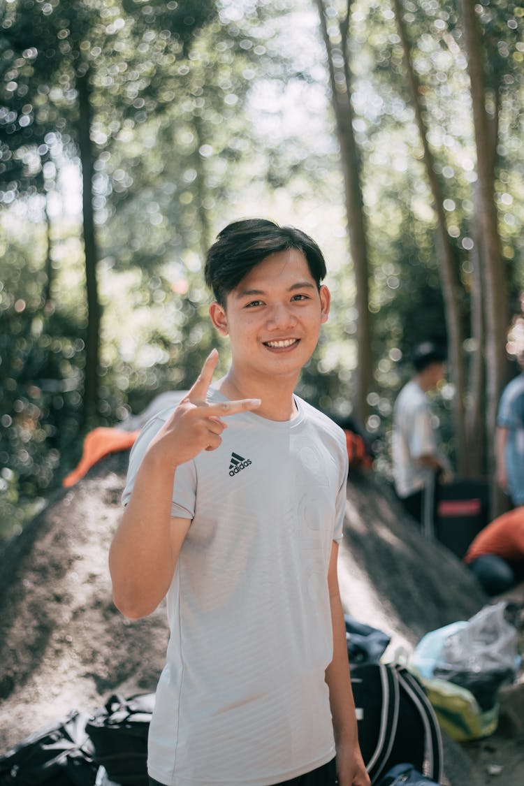 Happy Ethnic Teenager Showing V Sign