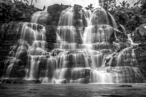 Majestic cascade in mountain valley