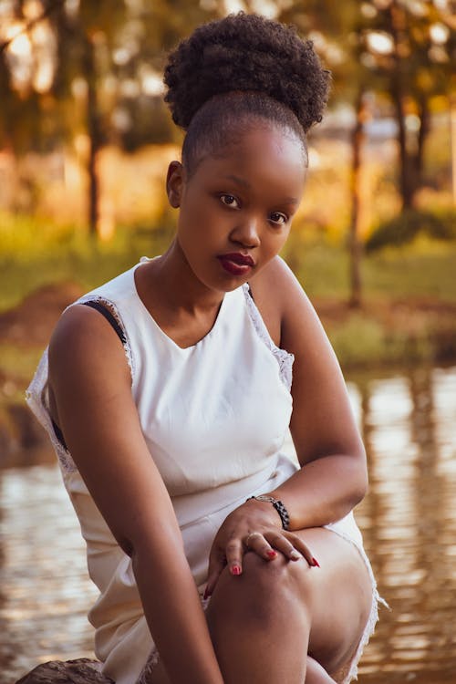 A Woman in White Tank Top