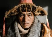 Man in Grey and Brown Fur Coat