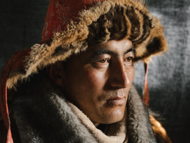 Portrait Of A Man Wearing A Fur Hat