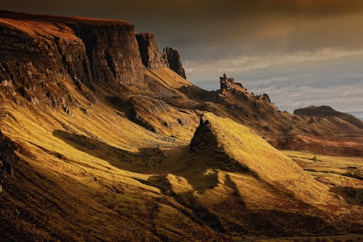 Captivating view of Quiraing on the Isle of Skye with dramatic lighting and rugged terrain.