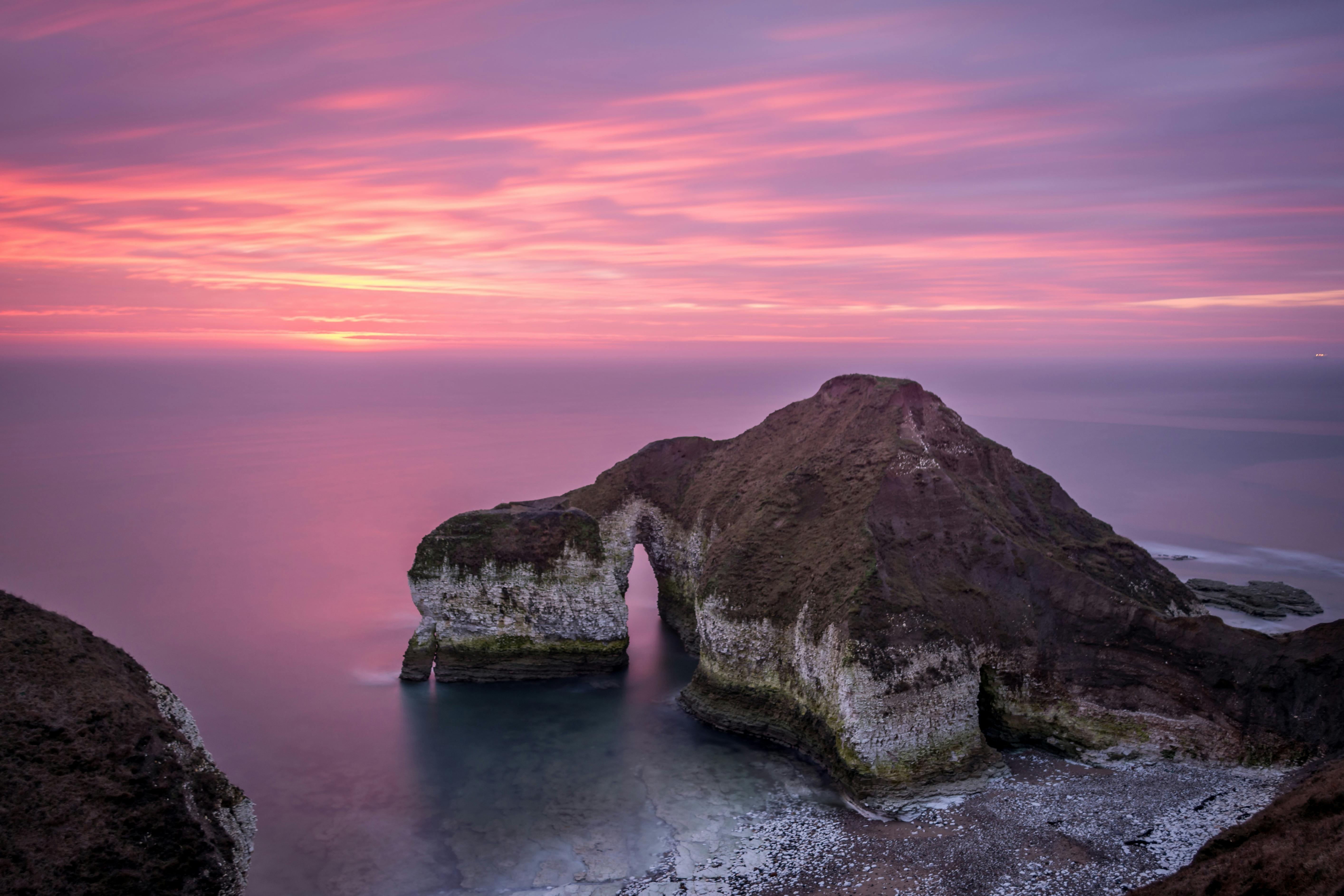 rocky cliff on sea