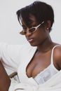 Woman in White Spaghetti Strap Top Wearing Brown Sunglasses