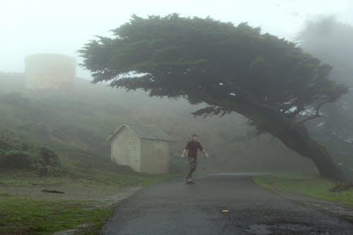 Man Skating after Rain