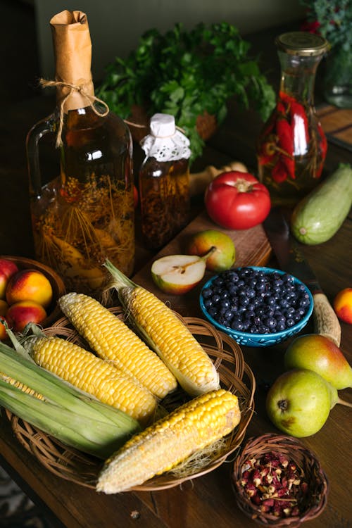 Vegetables and Fruits on Plates and Bowls