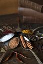Brown Wooden Ladle on Black Round Plate