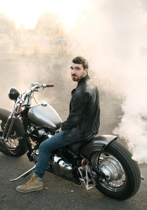 Man Sitting on a Motorbike