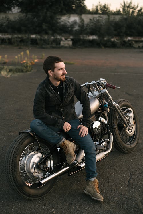Man Sitting on Motorcycle · Free Stock Photo