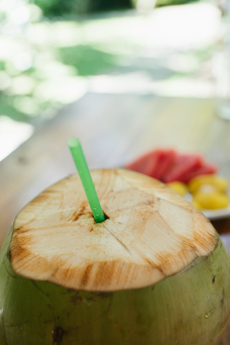 Plastic Straw In Fruit