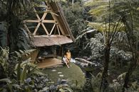 Couple Spending Vacation in a Bamboo House