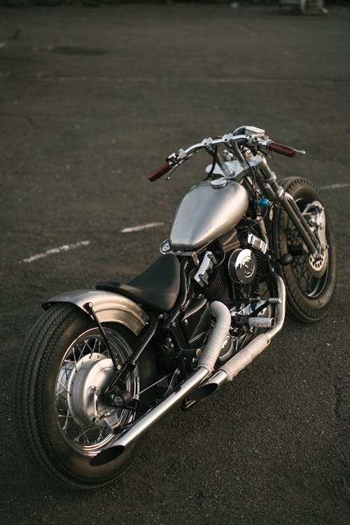 Free Black and Silver Cruiser Motorcycle on Asphalt Road Stock Photo