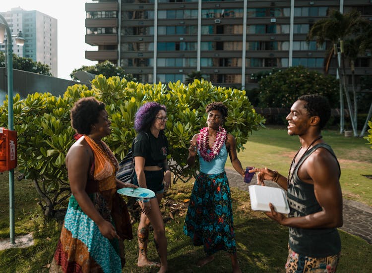 Photo Of Joyful People Partying In A Residential Park