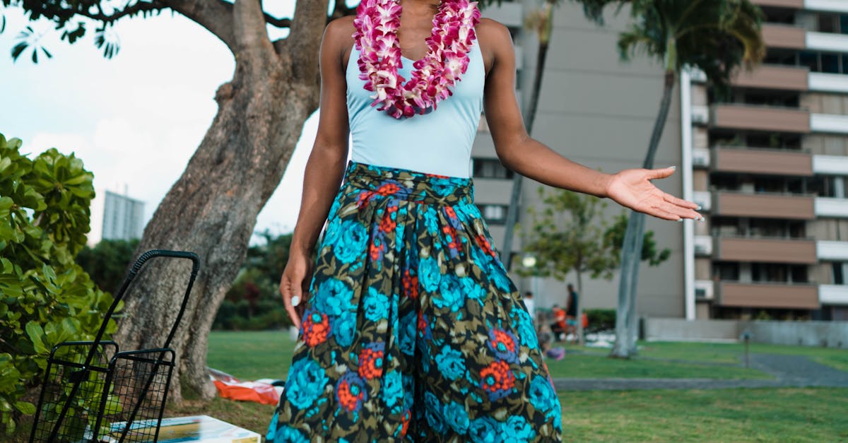 Photo by ArtHouse Studio A vibrant scene featuring a woman with a lei, captured outdoors in a lively setting.