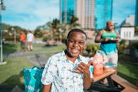 Smiling Boy Making Gesture