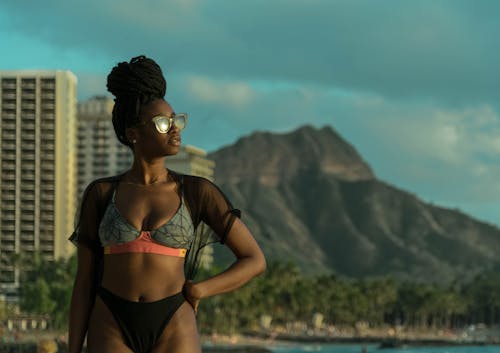 Woman in Black Bikini Wearing Sunglasses 