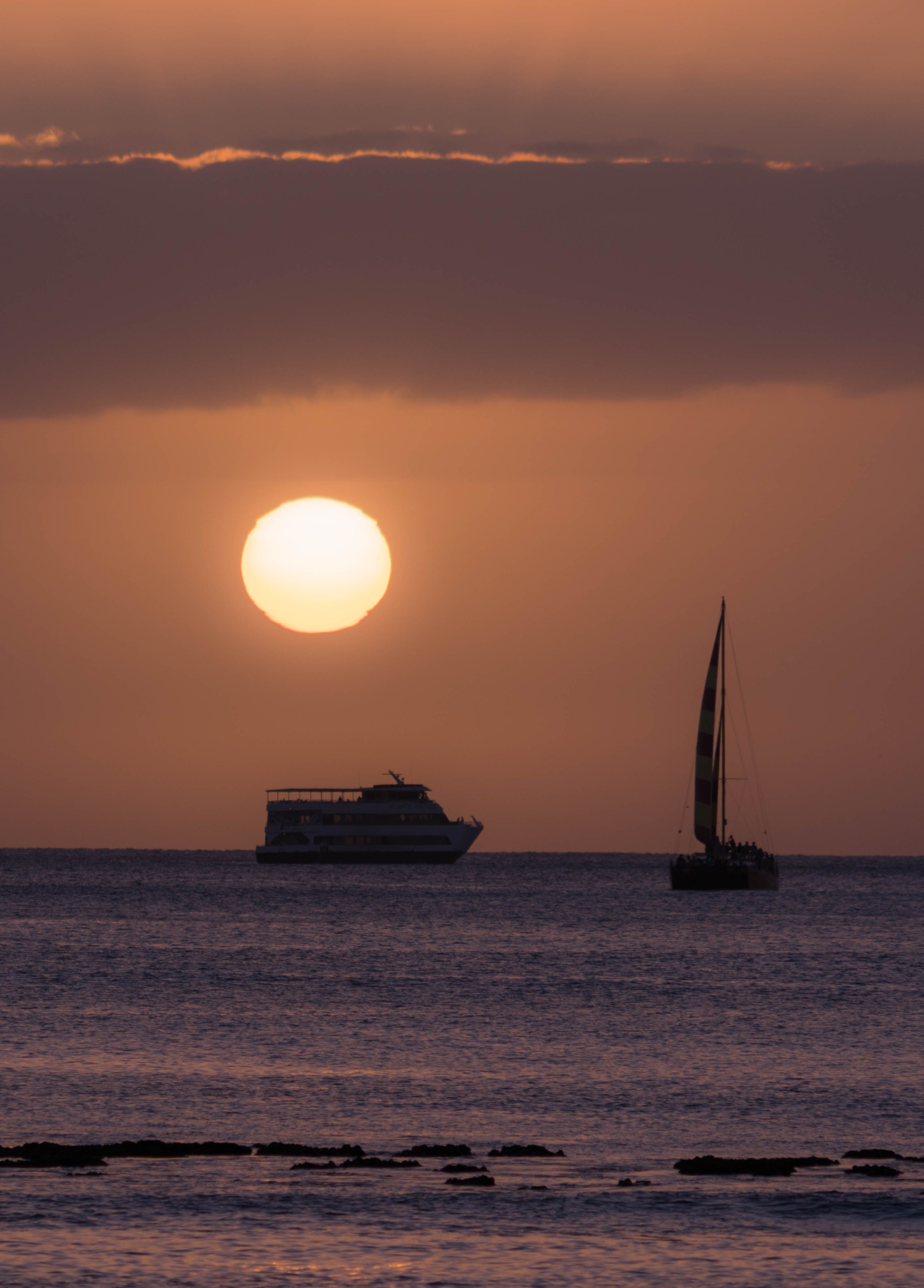 Silhouette of Sailboat on Sea during Sunset · Free Stock Photo