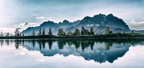 Free Plain Field in Front of Mountain Peak Stock Photo