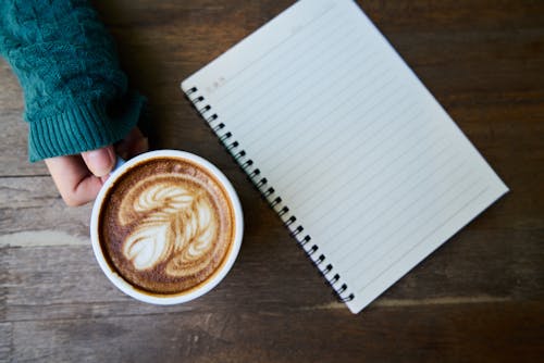 Free Cappuccino and Ruled Note Stock Photo