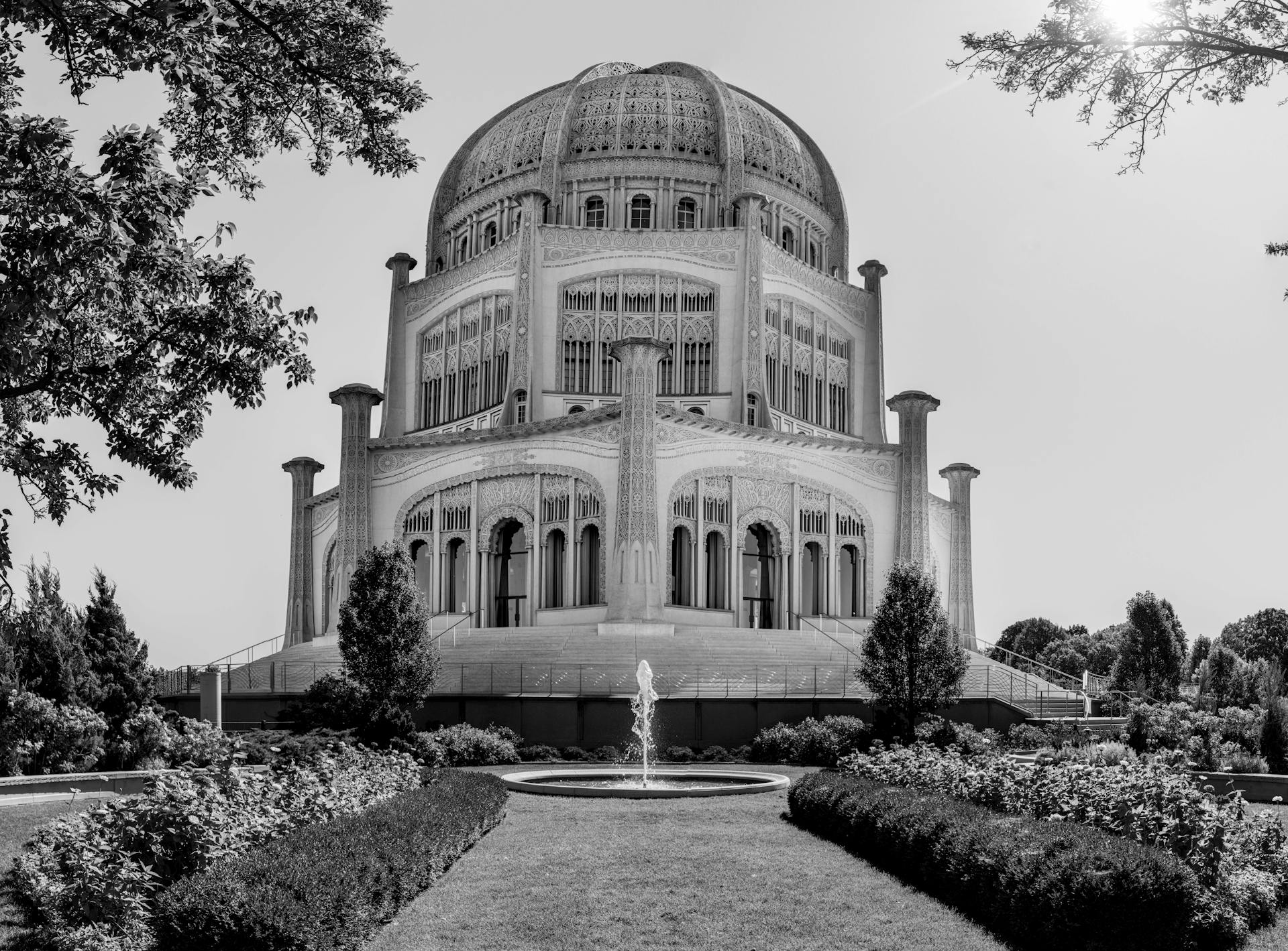 Facade of domed old Bahai temple on sunny day