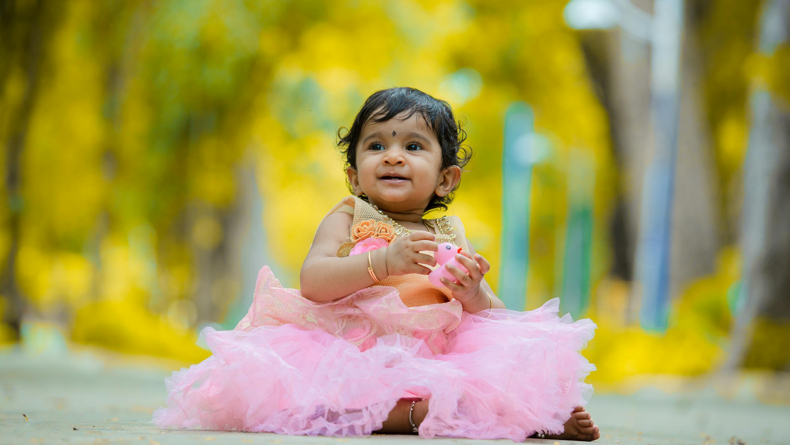 Indian Cute Baby Photo by Nila Racigan from Pexels: https://www.pexels.com/photo/adorable-ethnic-toddler-smiling-in-forest-4593615/