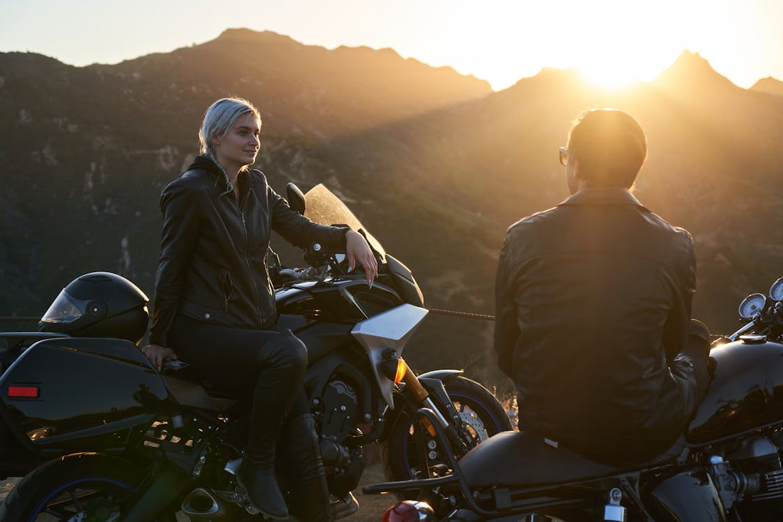 Man and Woman Riding on Motorcycle · Free Stock Photo