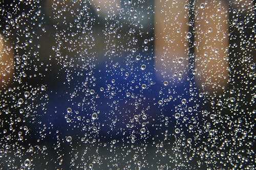 Free Water Droplets on Window Stock Photo