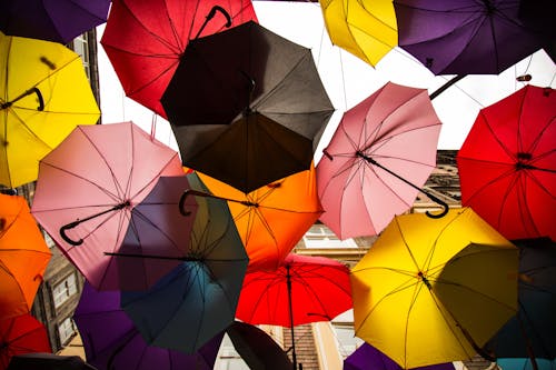 Low Angle Photo of Multi-colored Umbrella Roof