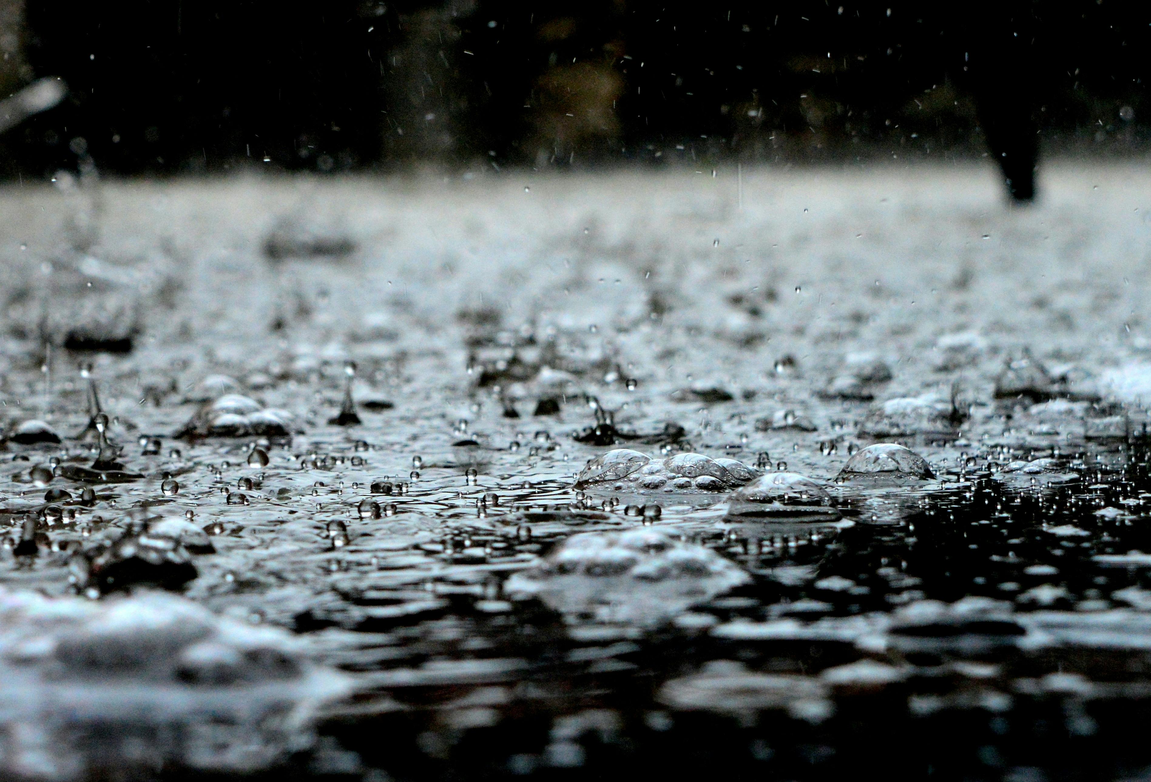 Brown sand after rain drops texture background Stock Photo - Alamy