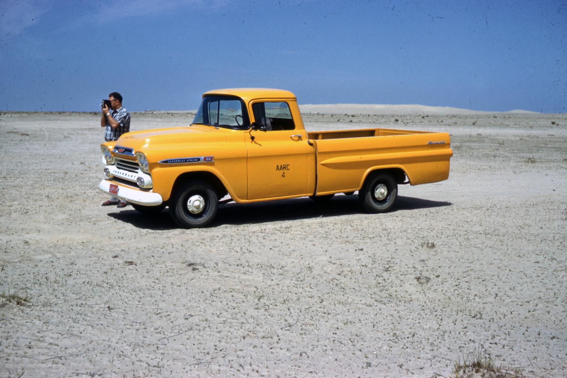 Yellow Chevrolet Single Cab Pickup Truck Parked on Road